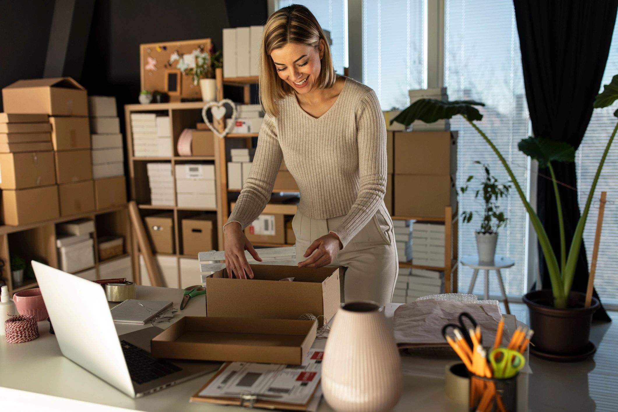 Online seller packing customer orders for shipment