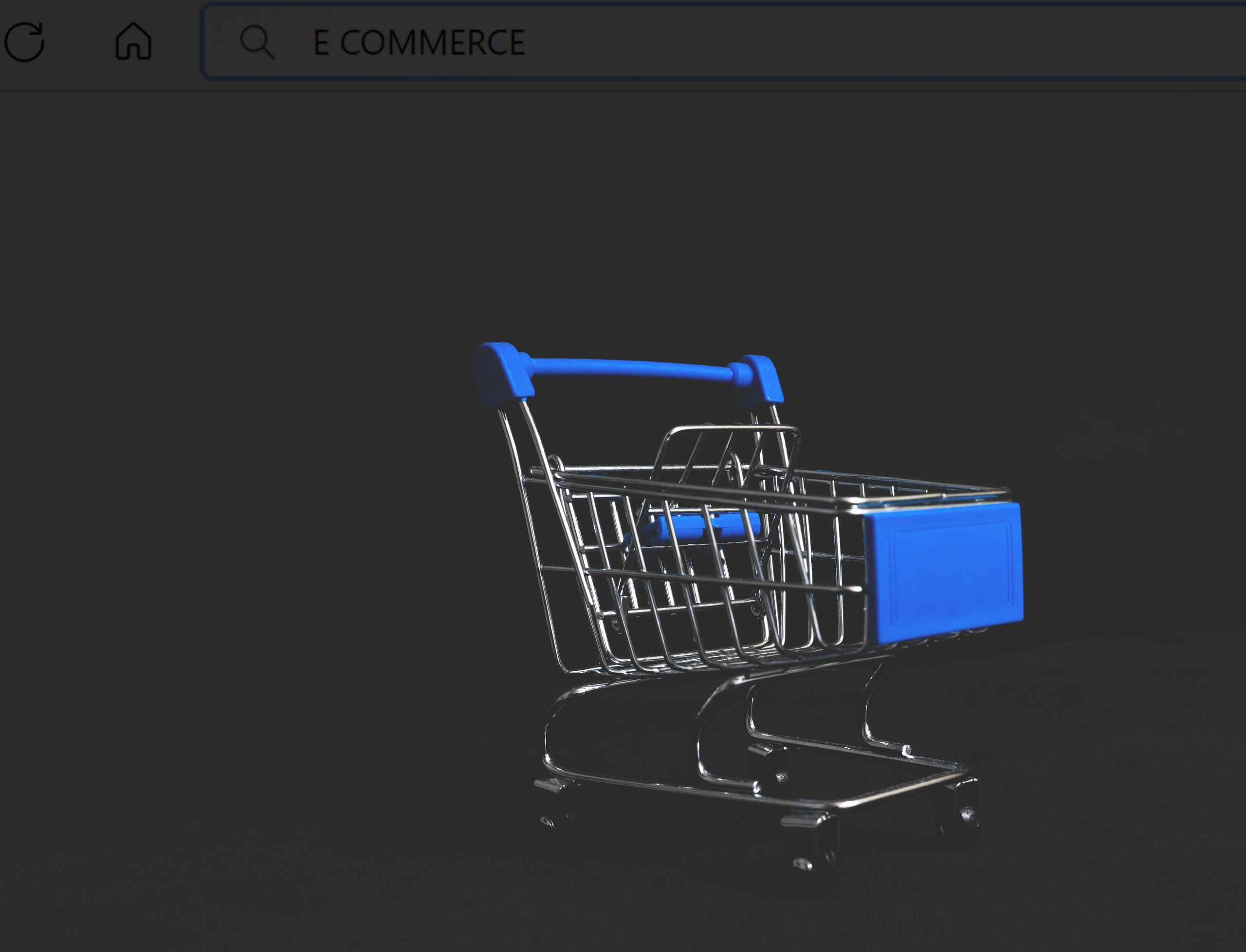 Online shopping concept with cart and browser