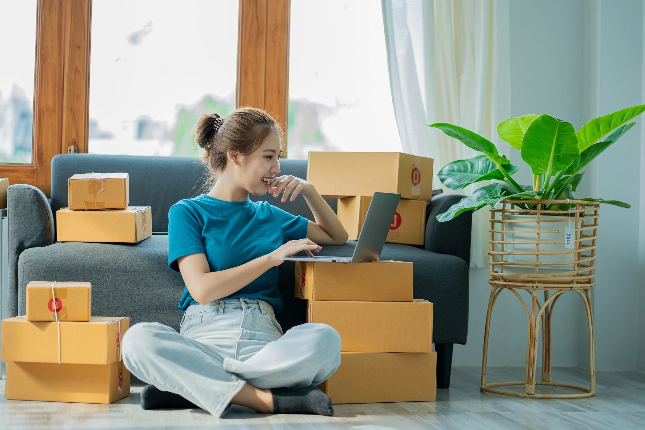 Entrepreneur managing an online marketplace business from a laptop