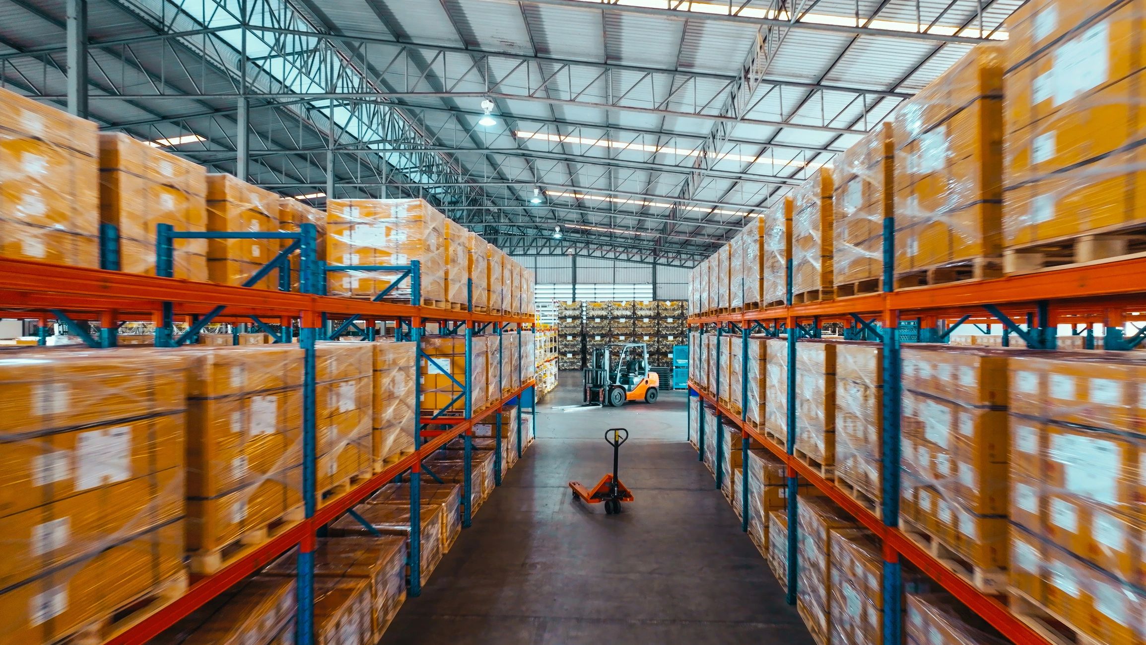 Warehouse inventory boxes stored on industrial shelves