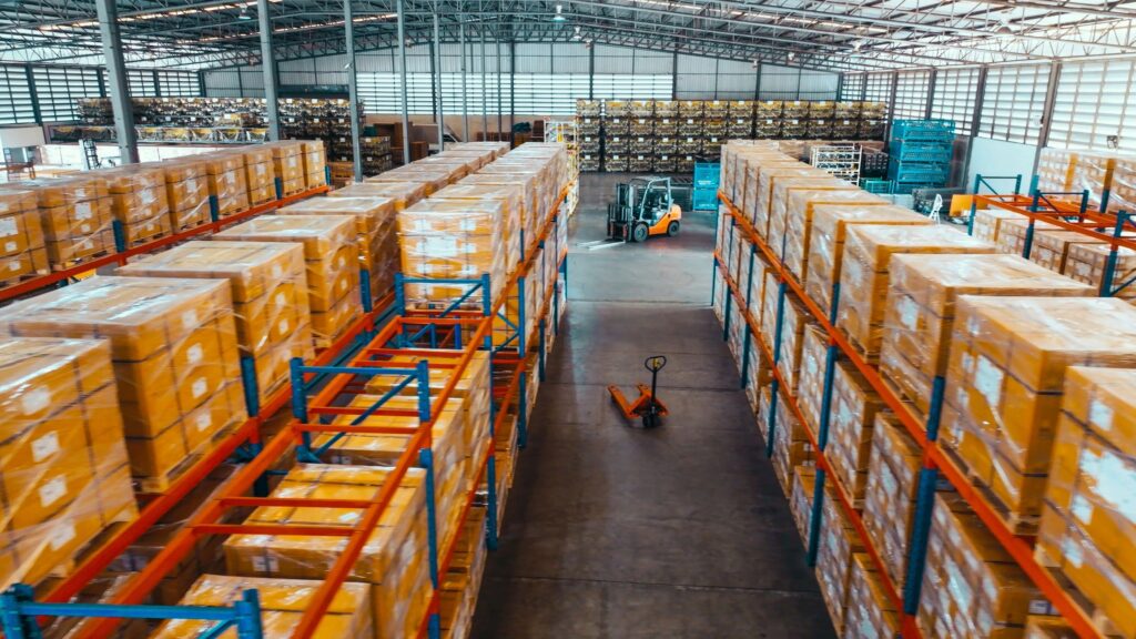 High angle view, merchandise packages stores on shelf rack in factory warehouse. Logistic industry business, industrial job career, factory work environment concept